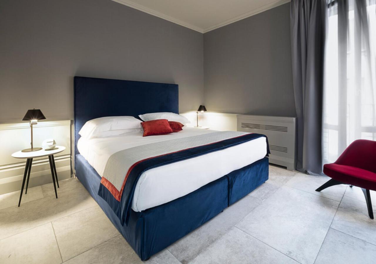 Palazzo Cornalia Hotell Milano Eksteriør bilde A bedroom at the hotel