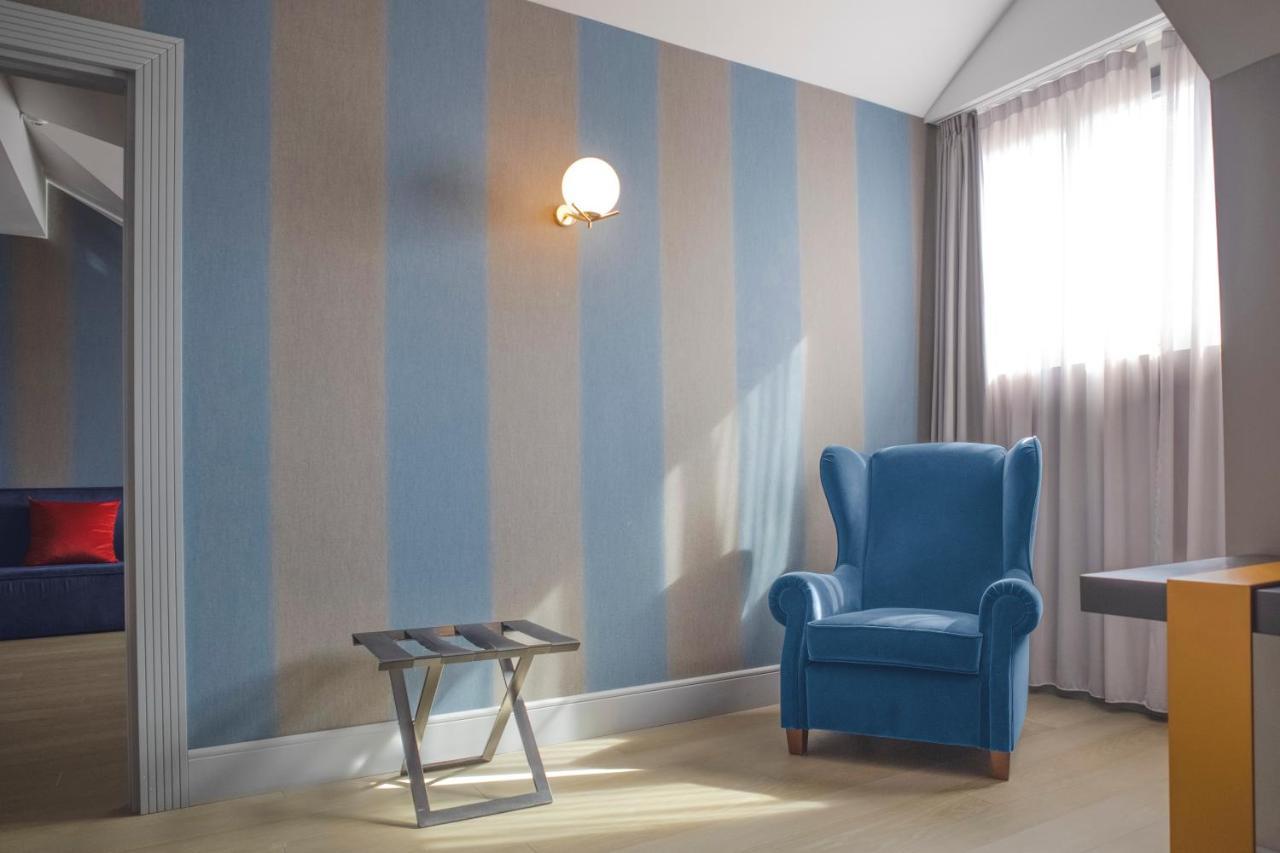 Palazzo Cornalia Hotell Milano Eksteriør bilde A room with a wall decorated with a venetian plaster